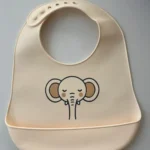 Yummy Bavoir en silicone avec poche Elephant 9m+ Beige