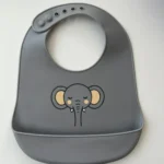 Yummy Bavoir en silicone avec poche Elephant 9m+ Gris