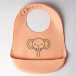 Yummy Bavoir en silicone avec poche Elephant 9m+ Corail