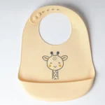 Yummy Bavoir en silicone avec poche Girafe 9m+ Beige